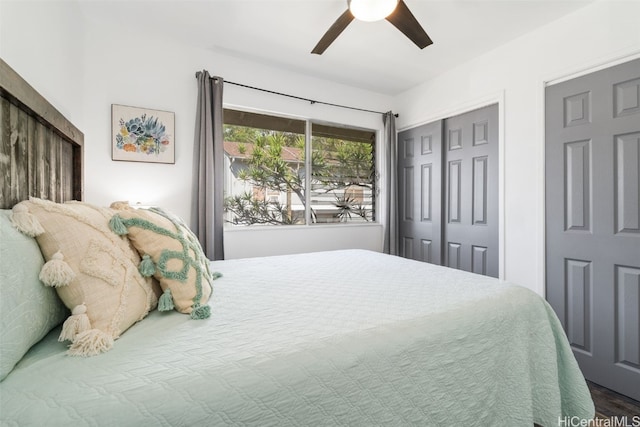 bedroom featuring ceiling fan and a closet