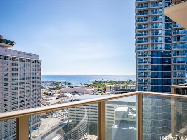 balcony featuring a water view