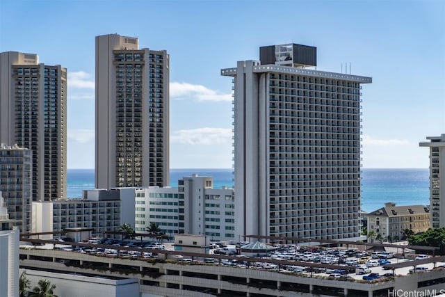 property's view of city featuring a water view