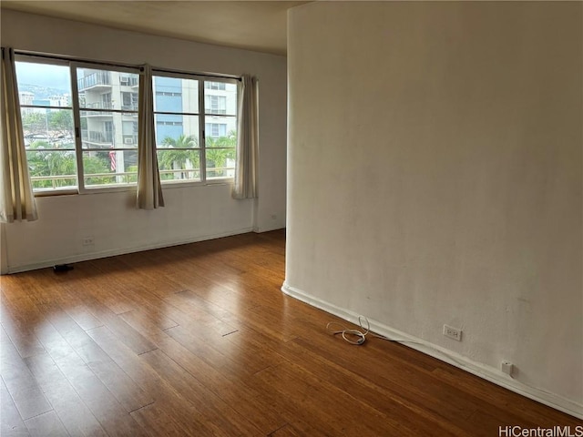 empty room with light hardwood / wood-style floors