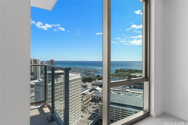 balcony featuring a water view