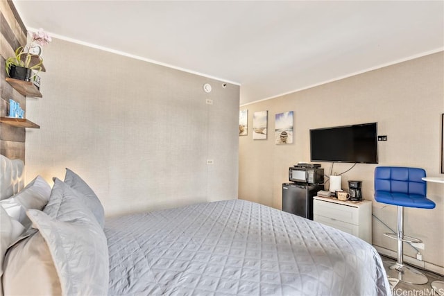 bedroom with crown molding