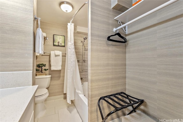 full bathroom featuring tile patterned floors, vanity, shower / bathtub combination with curtain, and toilet