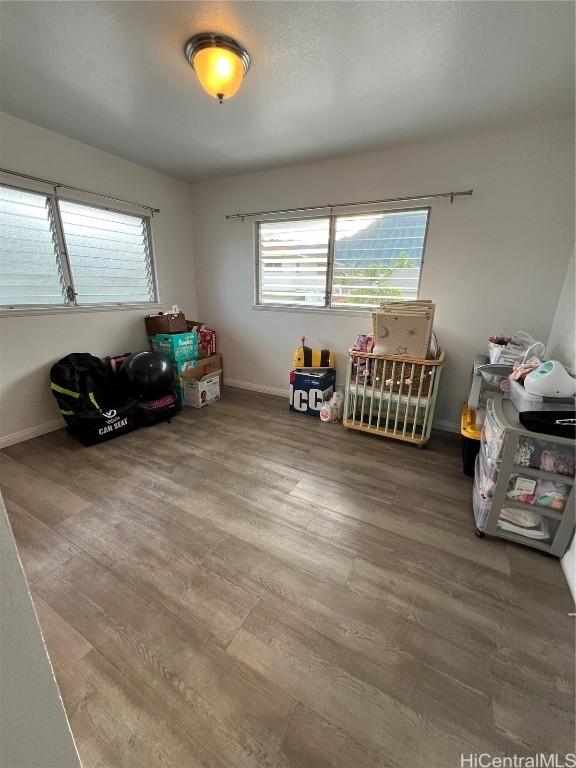 interior space with hardwood / wood-style floors