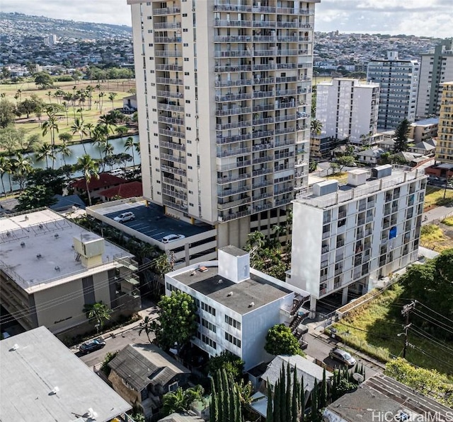 birds eye view of property with a water view