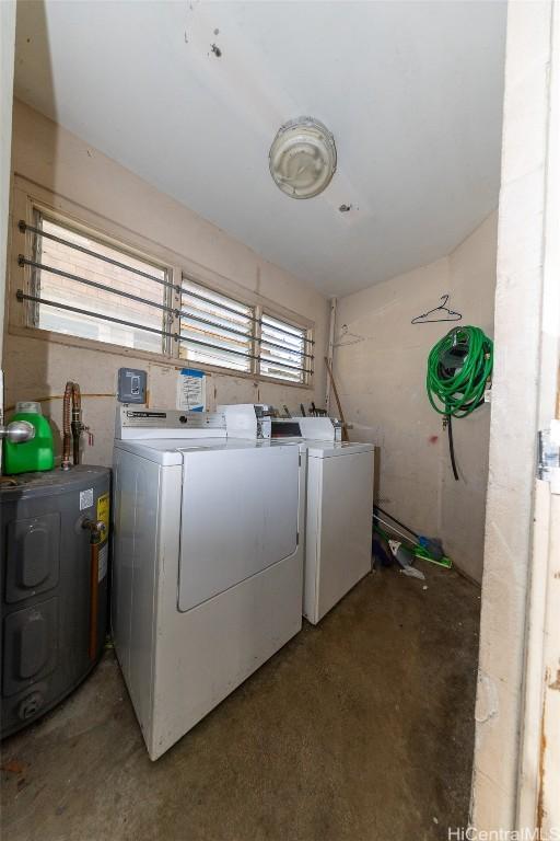 laundry area with independent washer and dryer