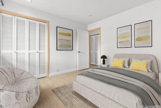 bedroom with light wood-type flooring