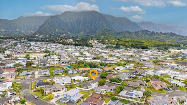 46-145 Humu Pl, Kaneohe, HI 96744 - aerial overview of property's location with a mountain backdrop and nearby suburban area