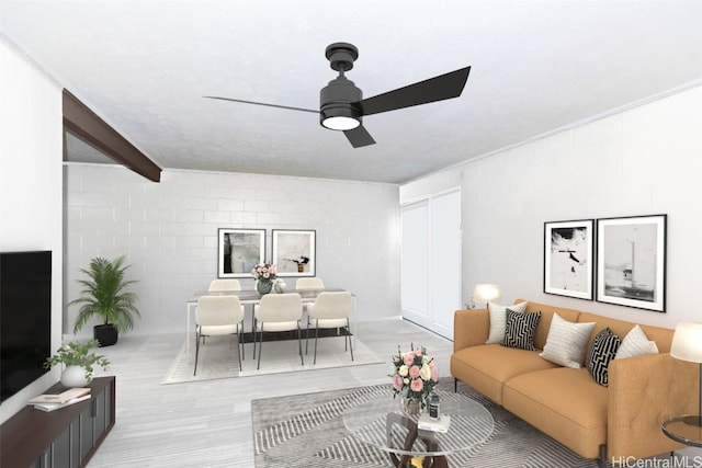 living room featuring beam ceiling, ceiling fan, and light hardwood / wood-style floors