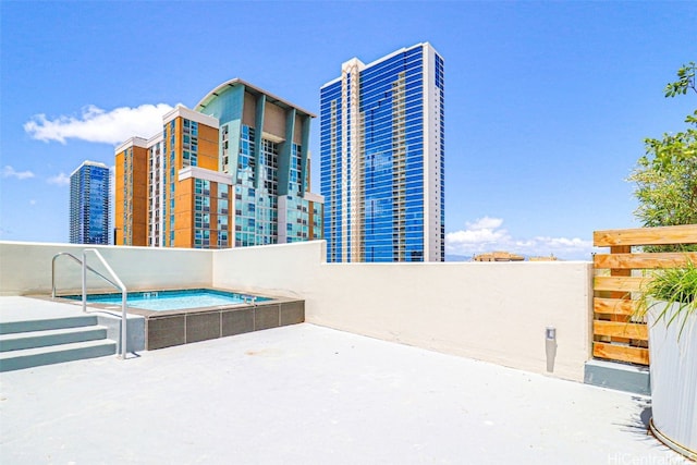 615 Keawe St Unit 406, Honolulu, HI 96813 - view of patio / terrace featuring a hot tub