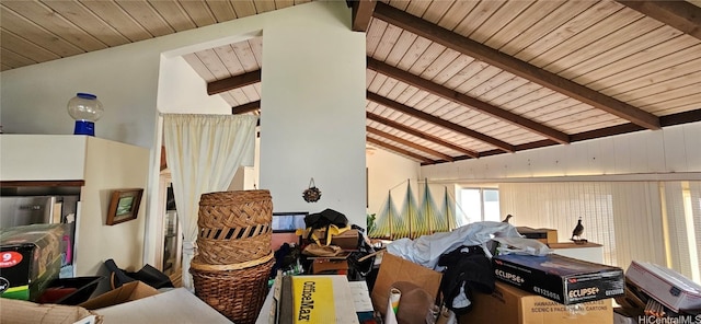 interior space featuring beamed ceiling and high vaulted ceiling