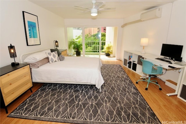 bedroom featuring hardwood / wood-style flooring, ceiling fan, and an AC wall unit