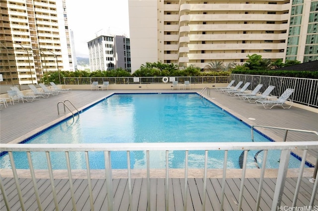 view of swimming pool featuring a patio