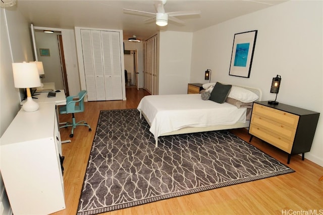 bedroom featuring a closet, hardwood / wood-style flooring, and ceiling fan