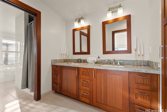 bathroom featuring tile patterned floors and vanity