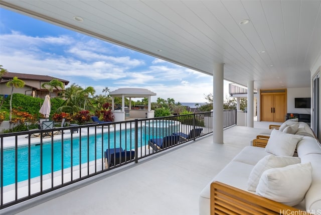 view of pool featuring outdoor lounge area and a patio area