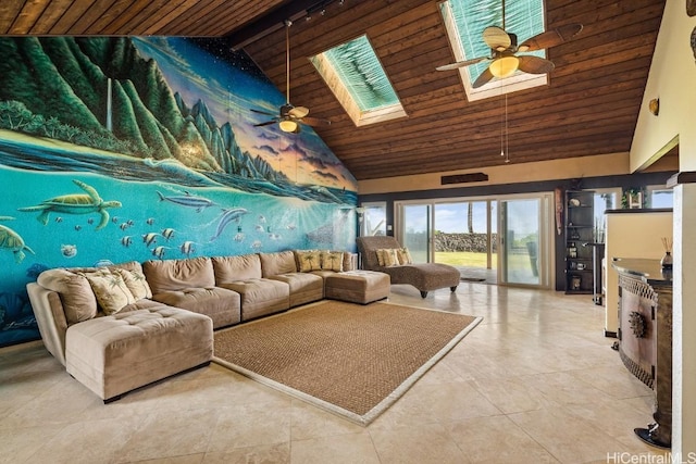 living room with beam ceiling, a skylight, high vaulted ceiling, and ceiling fan