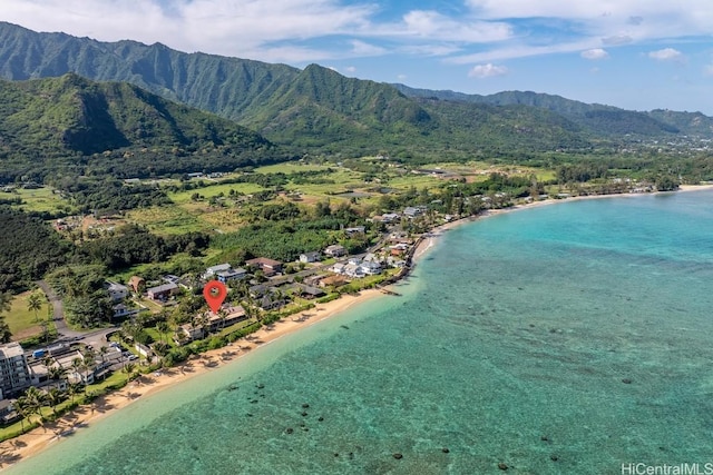 bird's eye view with a beach view and a water and mountain view