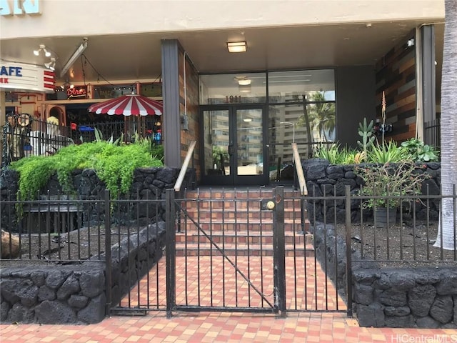 view of gate featuring french doors