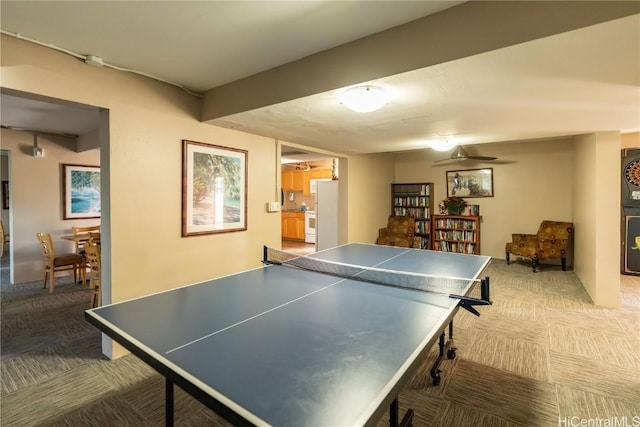 game room featuring ceiling fan and carpet floors