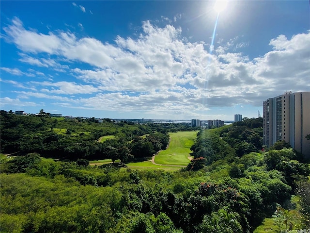 aerial view with a view of city and view of golf course