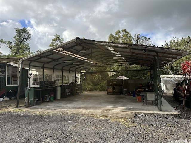 view of parking featuring a carport