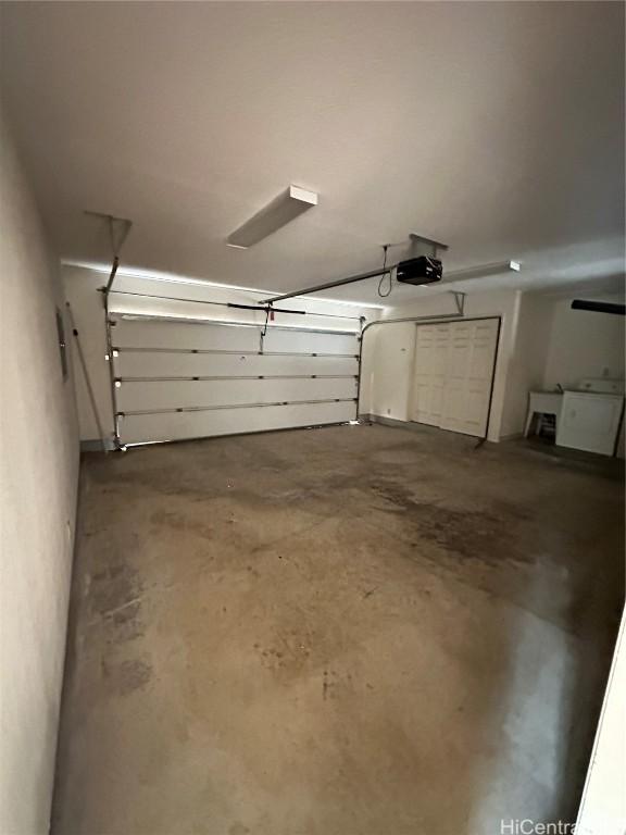 garage featuring a garage door opener