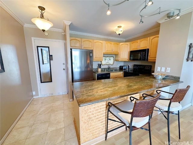 kitchen with light brown cabinets, crown molding, kitchen peninsula, and black appliances