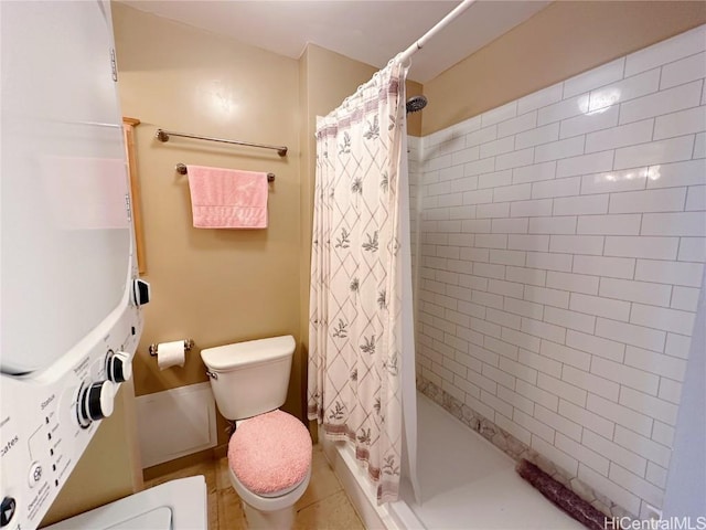 bathroom with toilet and curtained shower