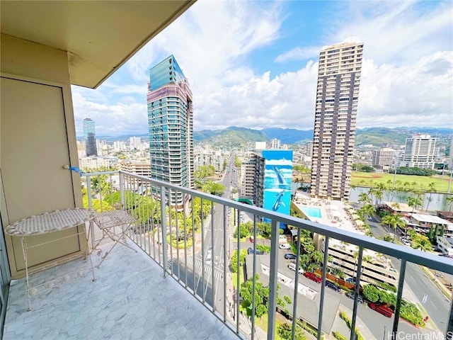 balcony featuring a mountain view