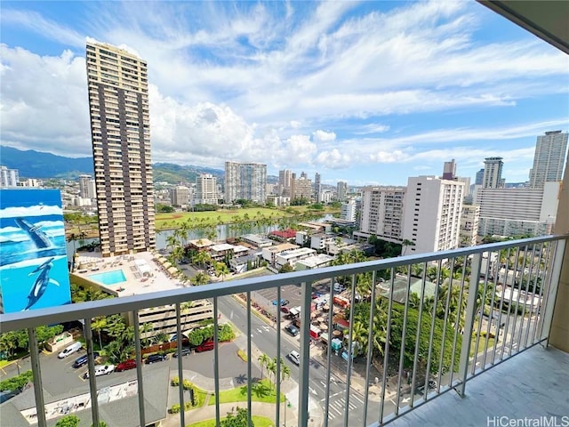 balcony featuring a mountain view