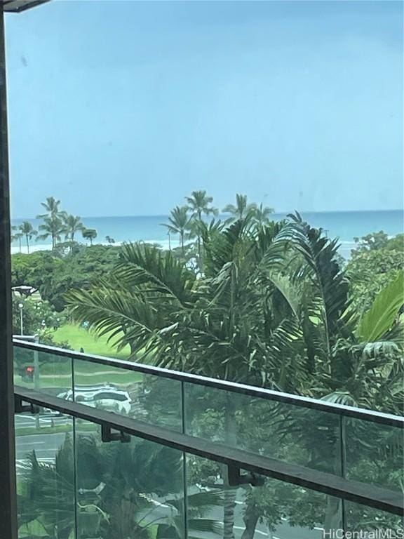 view of pool featuring a water view