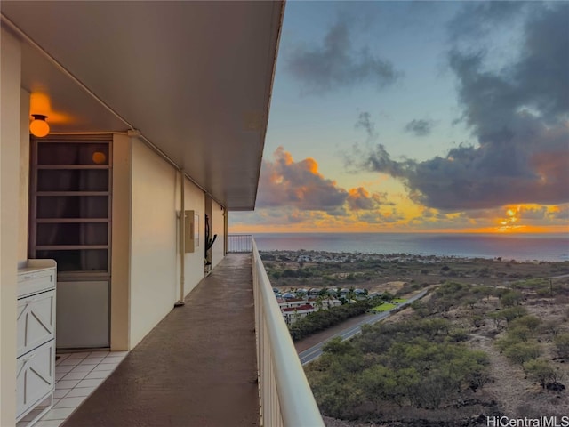 balcony at dusk with a water view