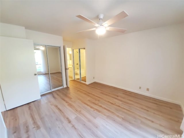 unfurnished bedroom featuring light wood-type flooring, ceiling fan, and a closet