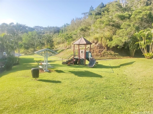 view of play area featuring a yard