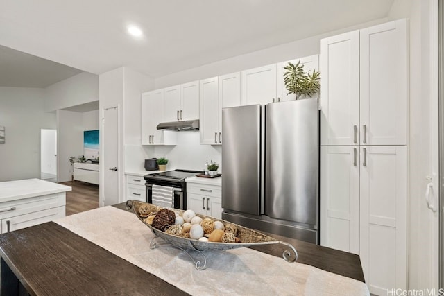 kitchen with white cabinetry and stainless steel appliances