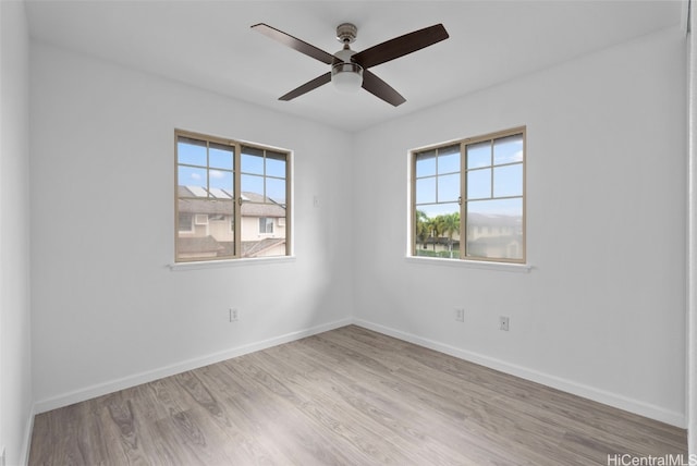 unfurnished room featuring ceiling fan and light hardwood / wood-style floors