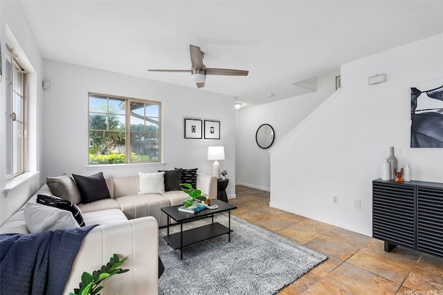 91-1171 Kaiau Ave Unit 207, Kapolei, HI 96707 - living area featuring ceiling fan and stone finish floors
