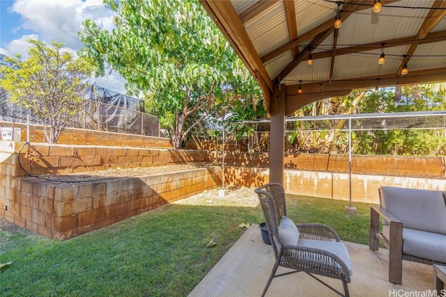 view of yard featuring a gazebo and a patio