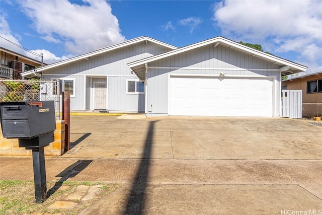 ranch-style home featuring a garage