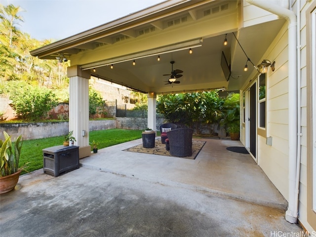 view of patio featuring ceiling fan