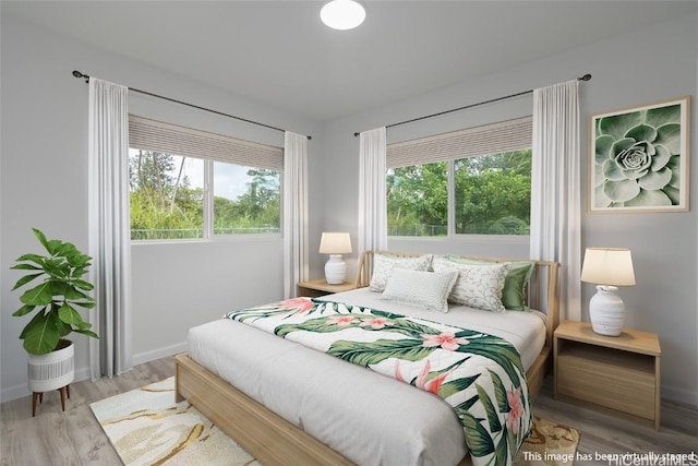 bedroom featuring light wood-type flooring