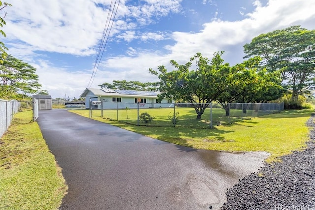 view of front of home featuring a front lawn