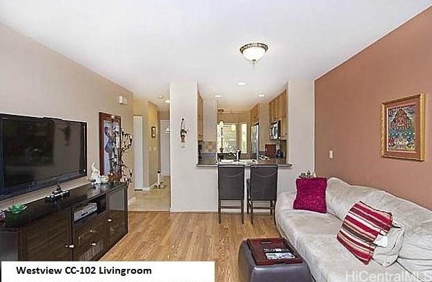 living room with light hardwood / wood-style flooring