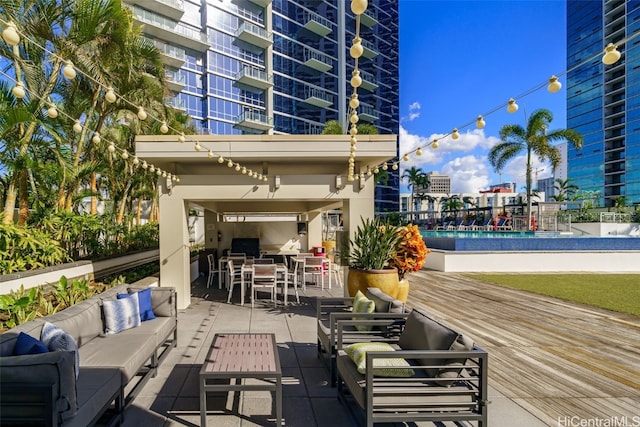 view of patio / terrace featuring an outdoor hangout area and a deck