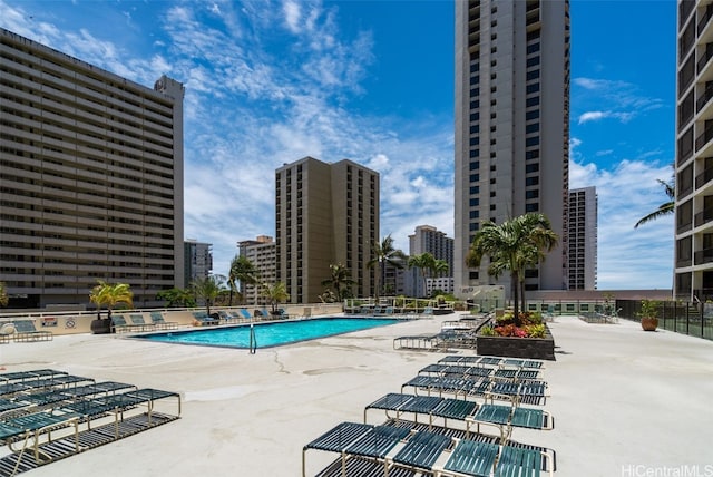 view of swimming pool with a patio area