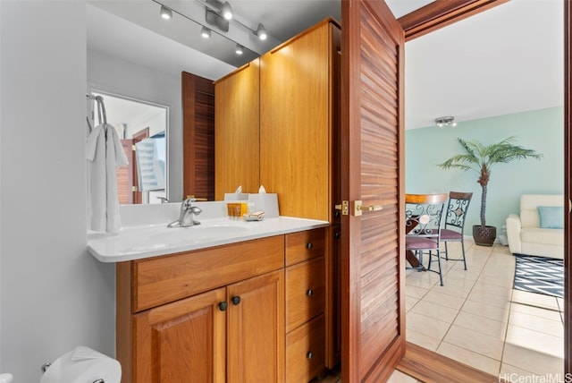 bathroom featuring tile patterned floors and vanity