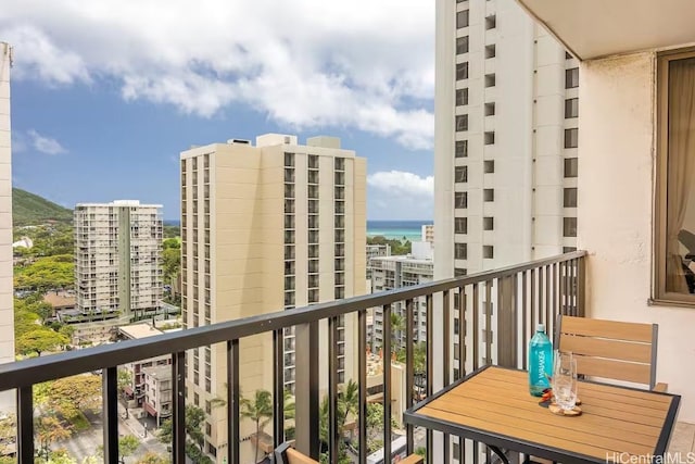 balcony featuring a water view