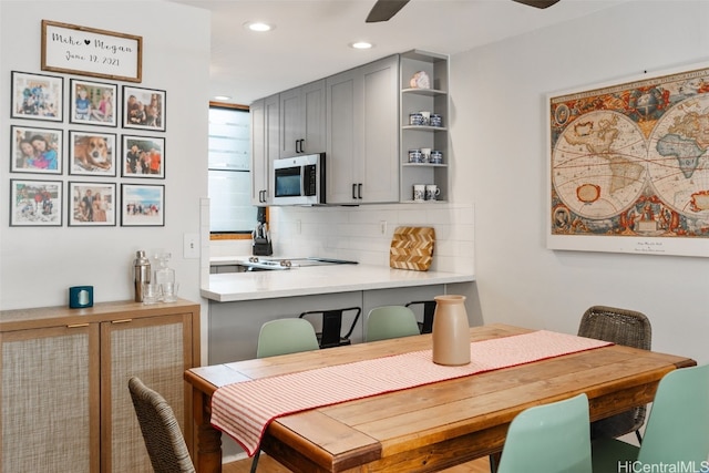 dining room with ceiling fan