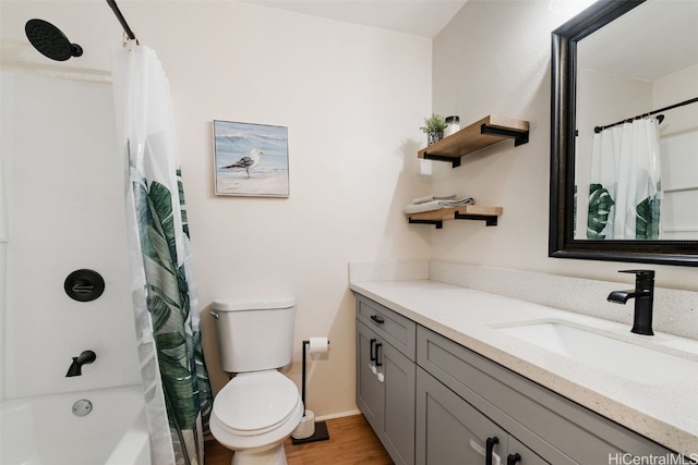 full bathroom with wood-type flooring, toilet, vanity, and shower / bathtub combination with curtain